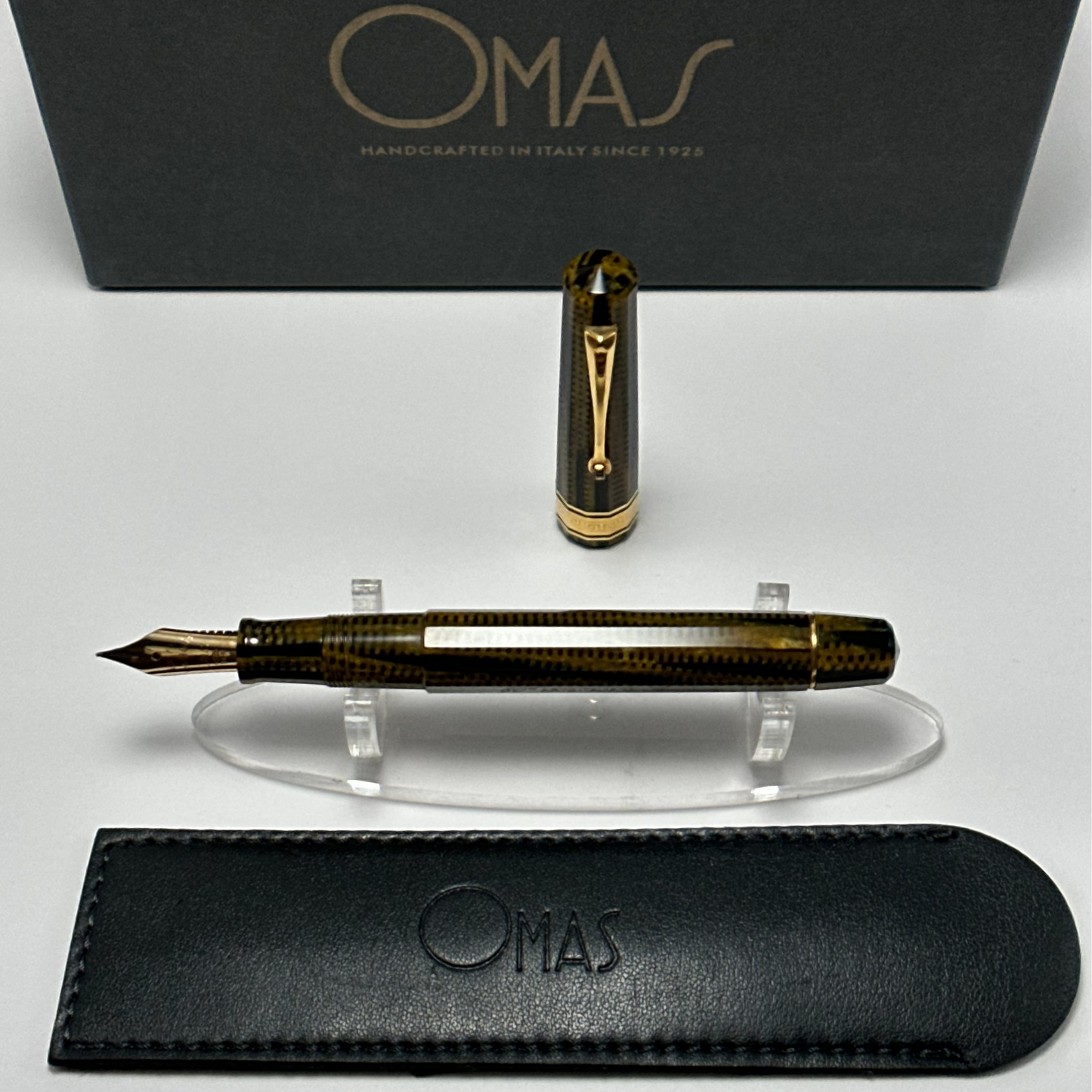 Omas Burkina Celluloid 80th Anniversary fountain pen uncapped, showing nib