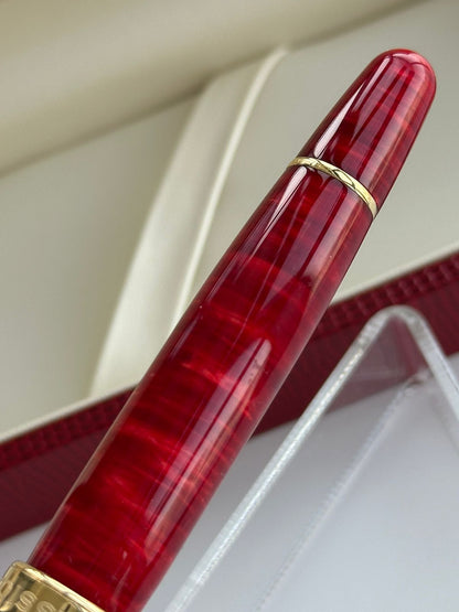 Lambrou Classic Pens LM1 fountain pen barrel, showing flame-red pattern