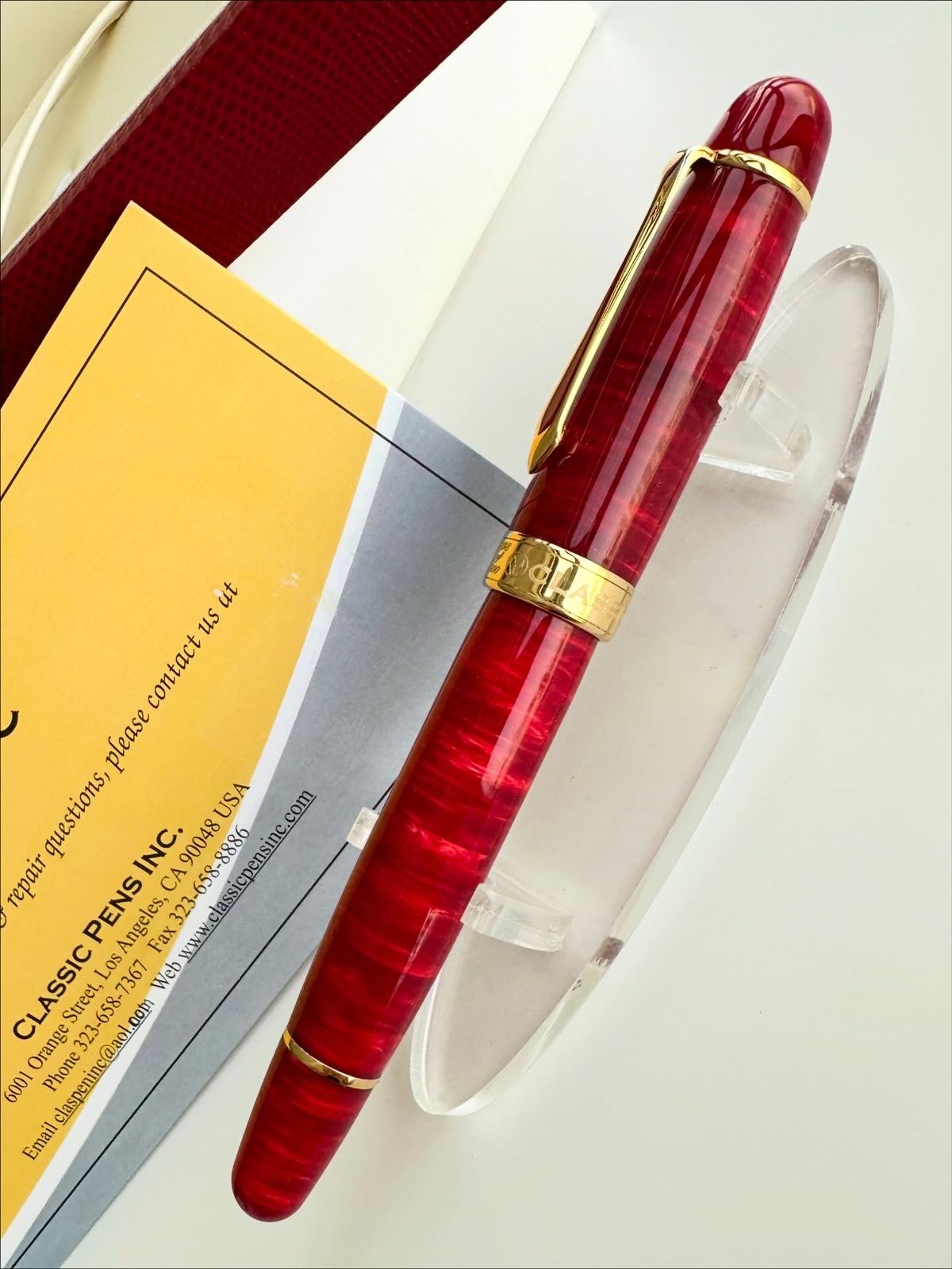 Close-up of the flame-red diffusion-bonded acrylic material on the LM1 pen