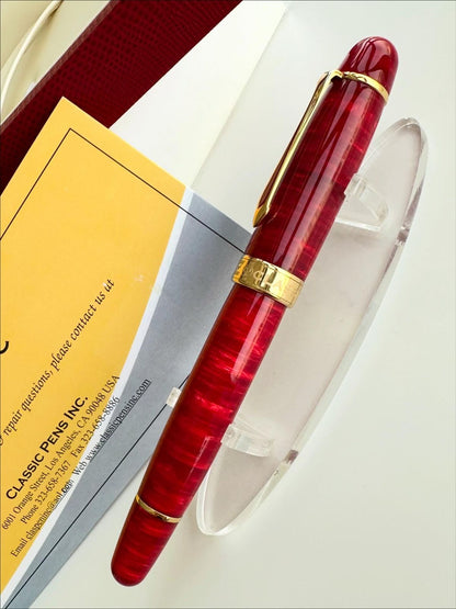 Close-up of the flame-red diffusion-bonded acrylic material on the LM1 pen