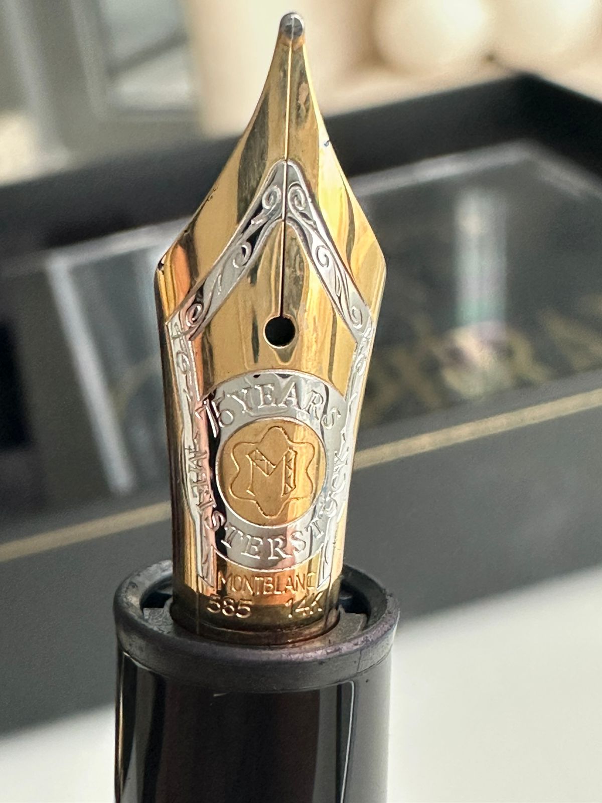 Close-up of the 14K gold triple-tone nib on the Montblanc Meisterstuck 75 Years Anniversary pen