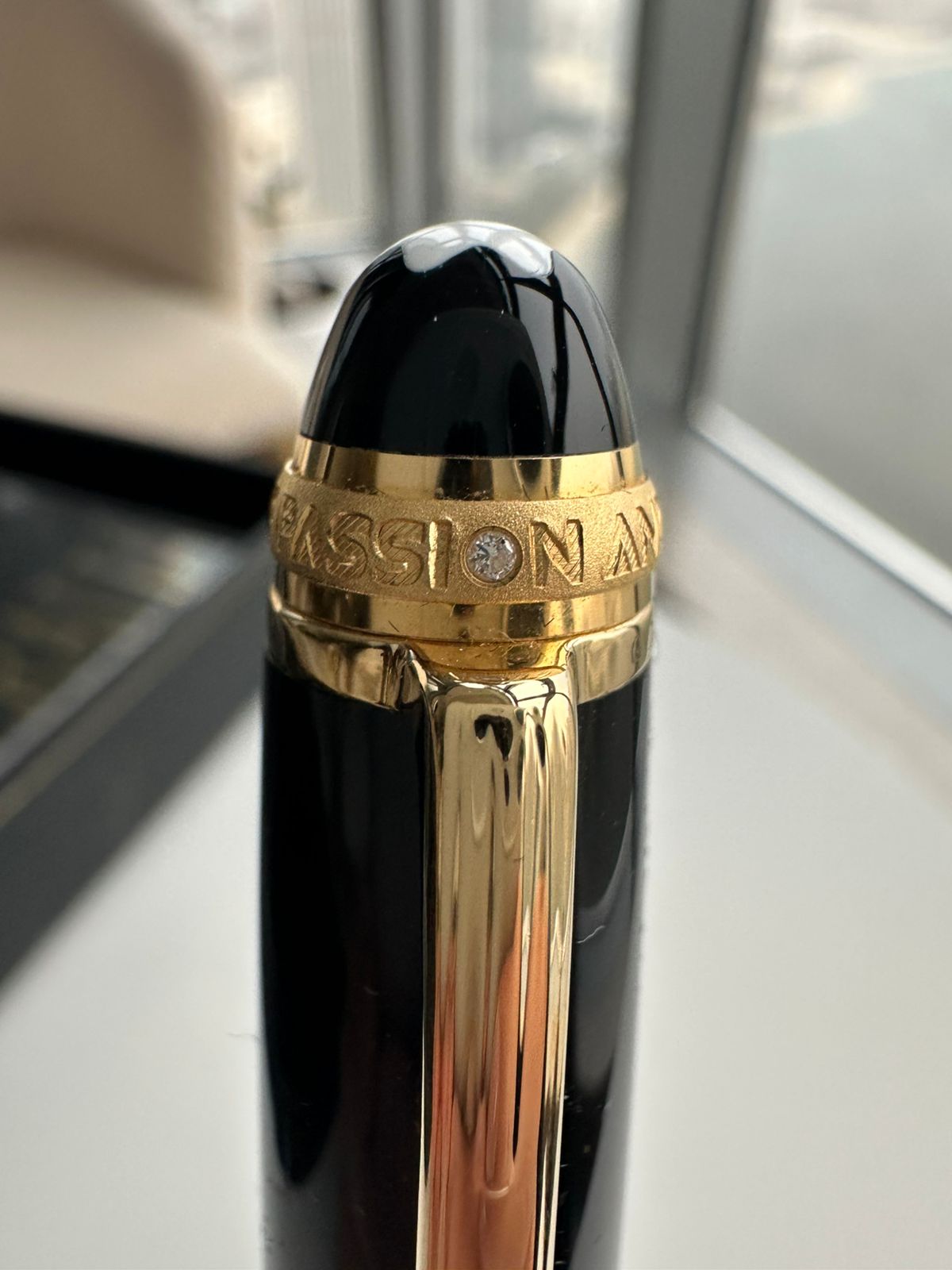 Gold-plated cap band embossed with the Montblanc name