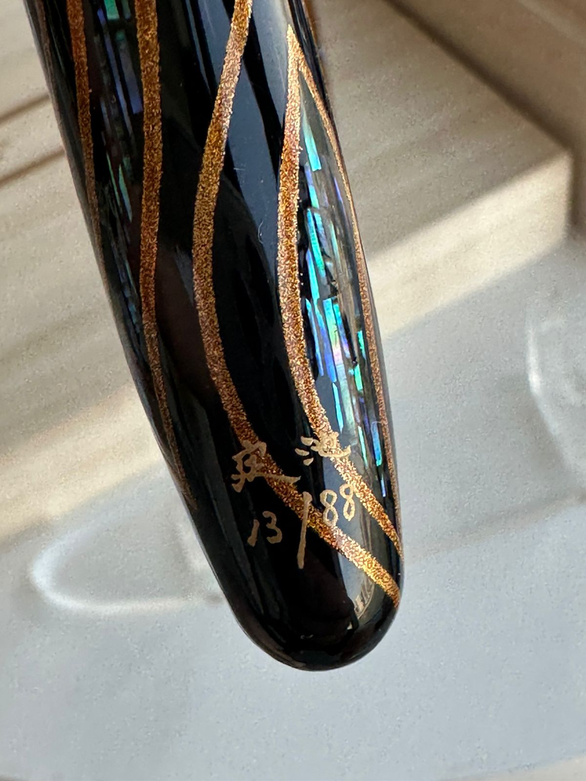 Limited edition number engraved on the TACCIA Miyabi Empress Sunset Peacock pen